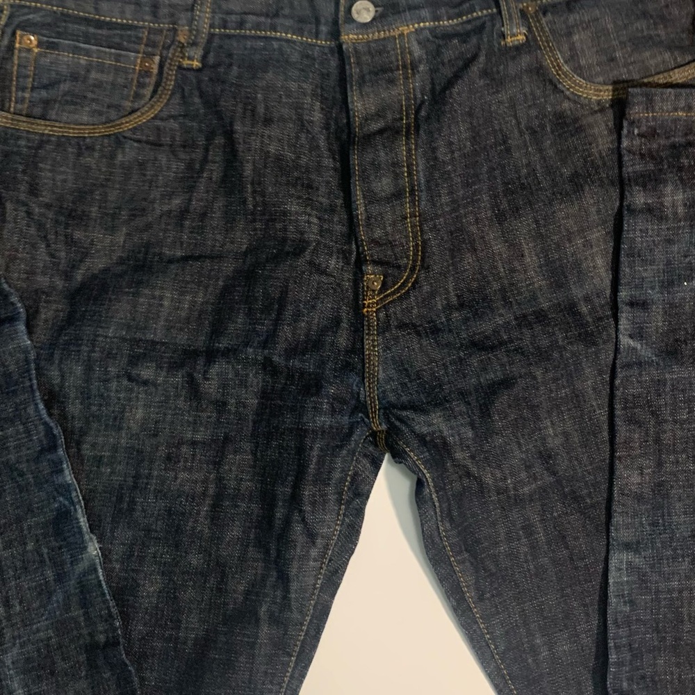 Has a lil stain on the pocket show in pic 2